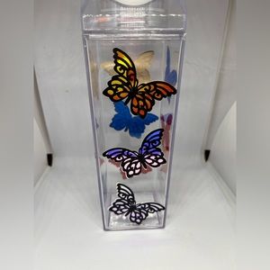 NWOT Milk Carton Water Bottle with holographic vinyl butterflies.